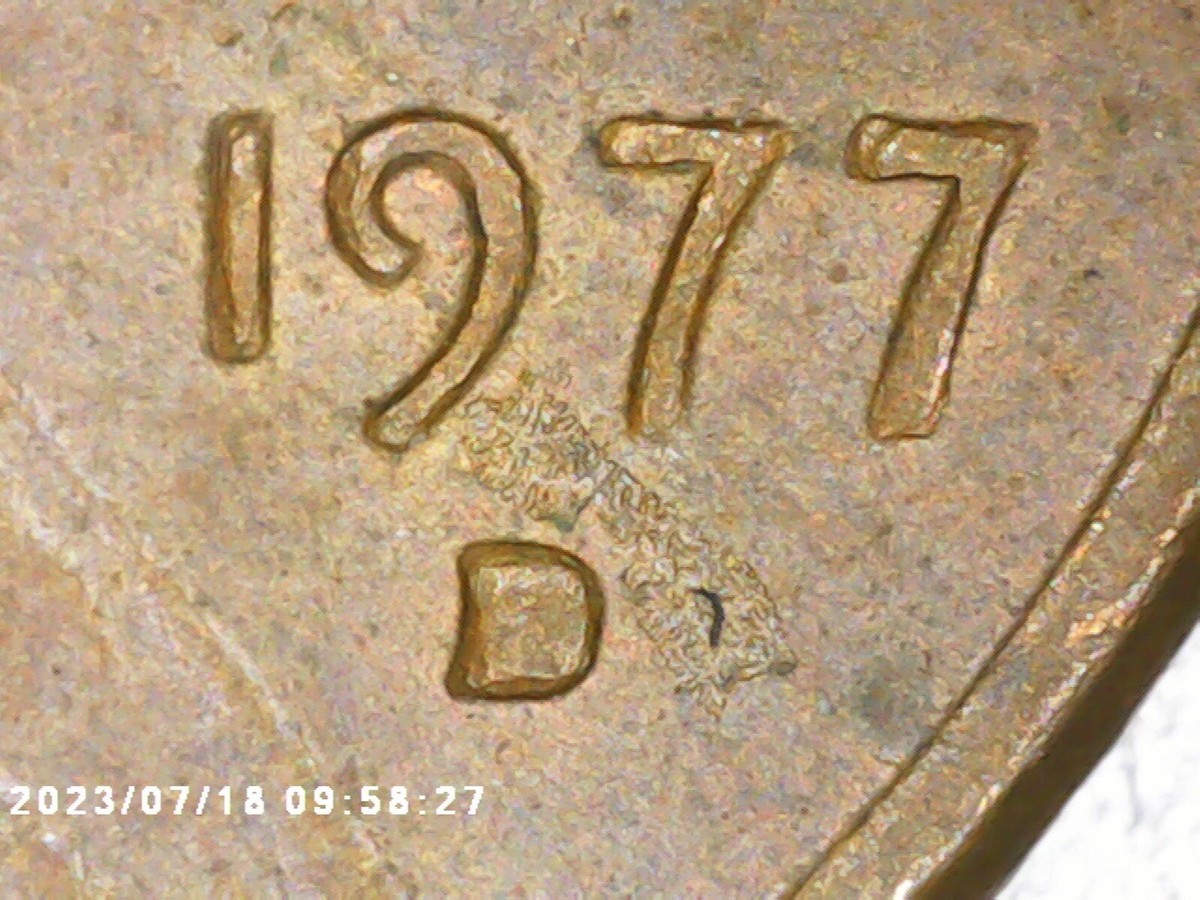 1977-D repunched mintmark error showing secondary D impression on 1977 Lincoln penny